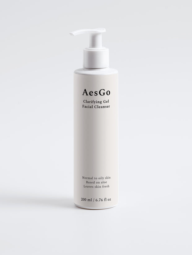 AesGo Clarifying Gel Facial Cleanser bottle, showing the clear gel texture designed to deep clean pores and remove impurities without stripping moisture.