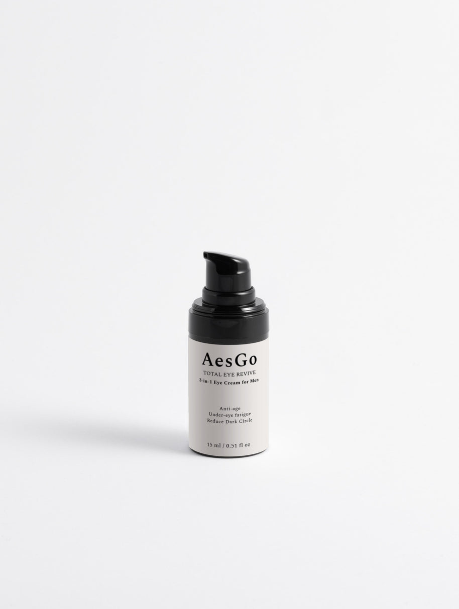 AesGo Total Eye Revive 3-in-1 eye cream packaging, formulated to target dark circles, puffiness, and fine lines around the delicate eye area.