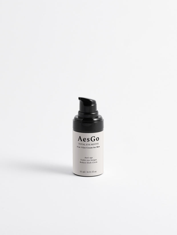 AesGo Total Eye Revive 3-in-1 eye cream packaging, formulated to target dark circles, puffiness, and fine lines around the delicate eye area.
