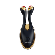 Black and gold facial massager with red accents on a white background, featuring the brand 'AesGo'.